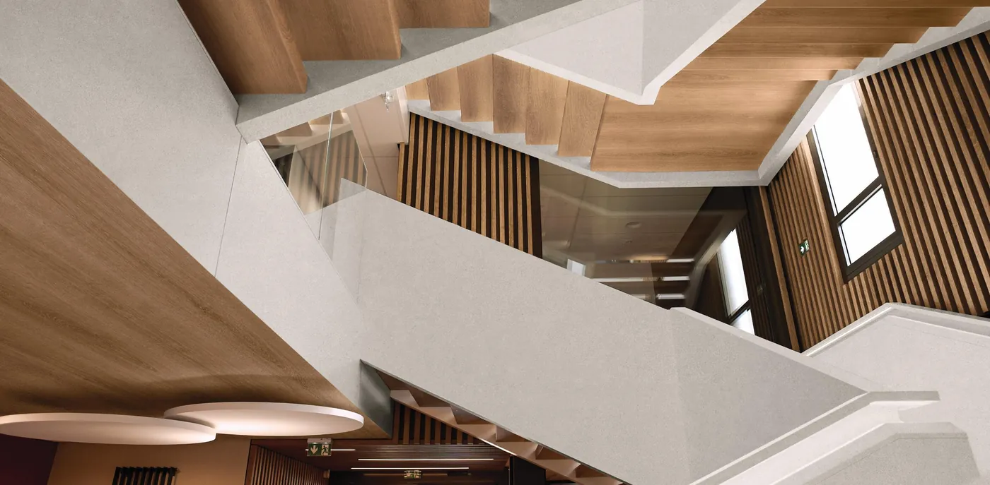 Stairwell with wood and stone film surfaces